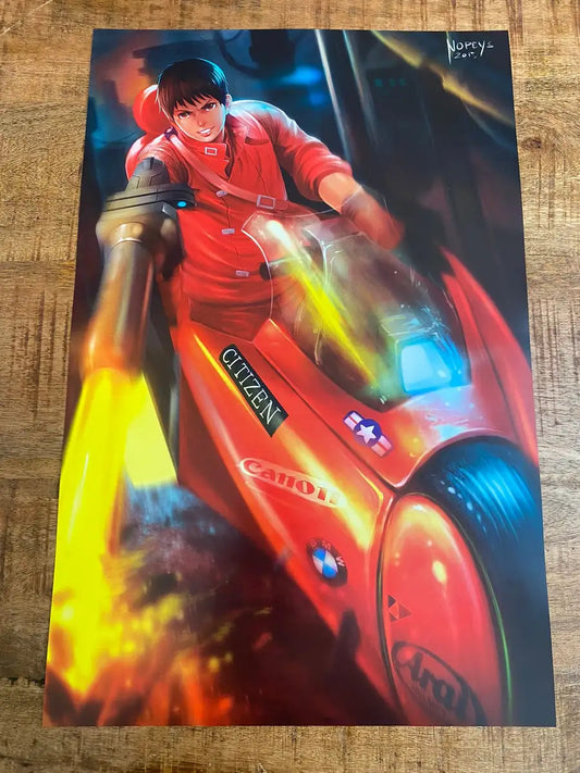 11x17 anime-style print of Kaneda on his red motorcycle from Akira — blazing through Neo-Tokyo.
